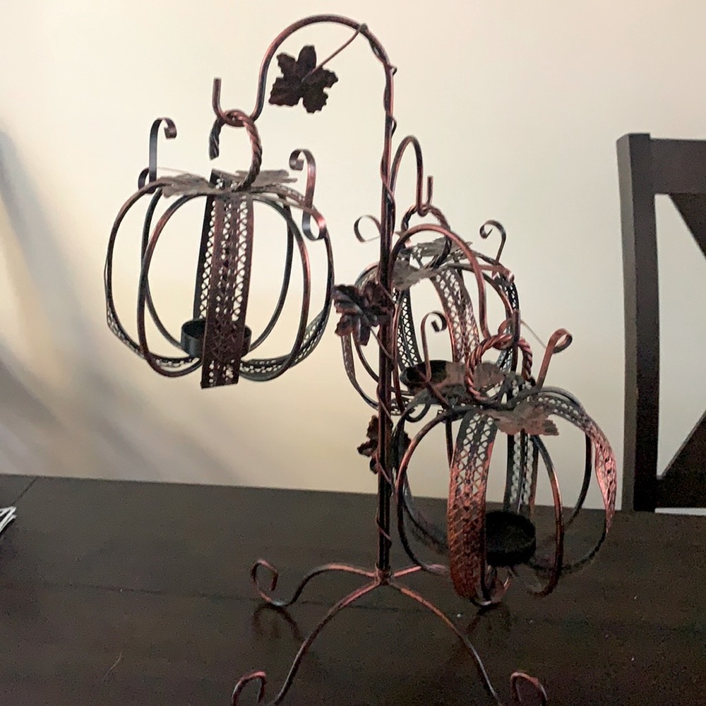 Michaels Crafts metal hanging pumpkin tea light holder table centerpiece.